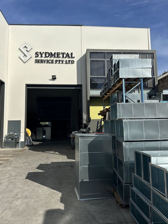 Sydmetal Service factory front with finished ductwork stacked outside